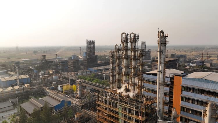 Safety-equipped team at Aarti Industries chemical manufacturing site