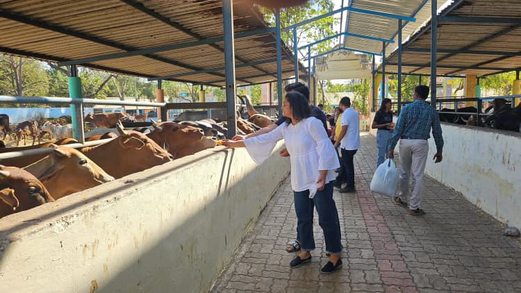 Diverse workforce in protective clothing at Aarti Industries manufacturing plant